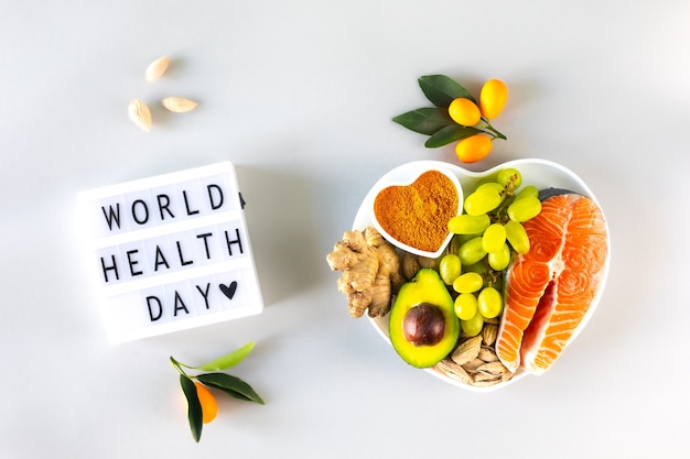 Healthy foods for boosting immunity and cold remedies, top view. World Health Day.