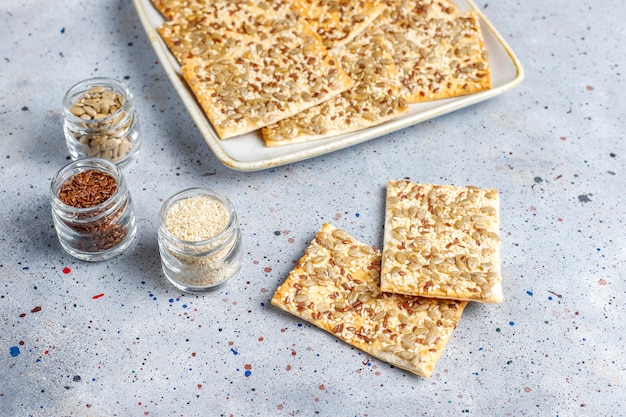 Free photo healthy fresh baked gluten free crackers with seeds.