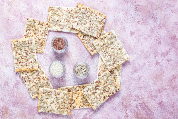 Free photo healthy fresh baked gluten free crackers with seeds.