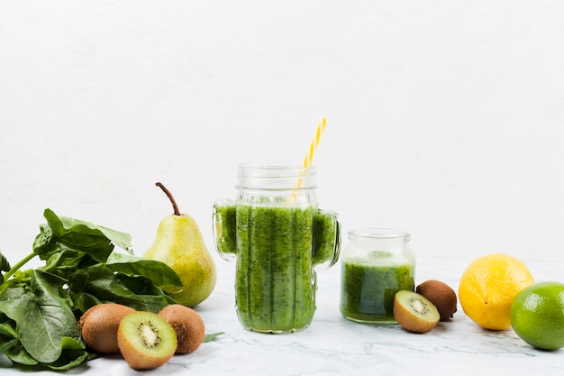 Healthy green shake and ingredients