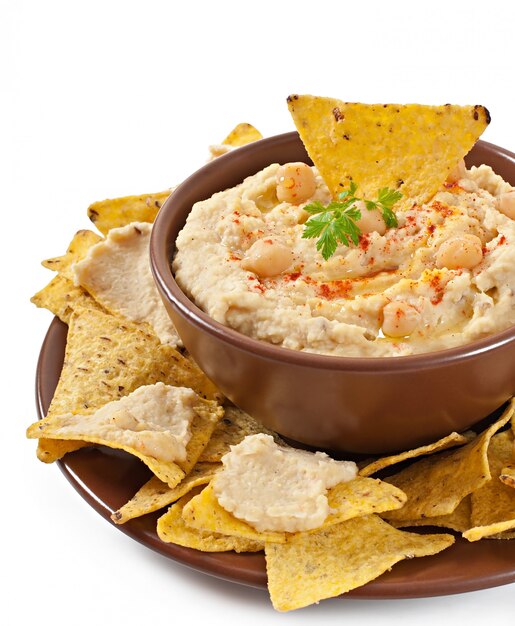 Healthy homemade  hummus with olive oil and pita chips