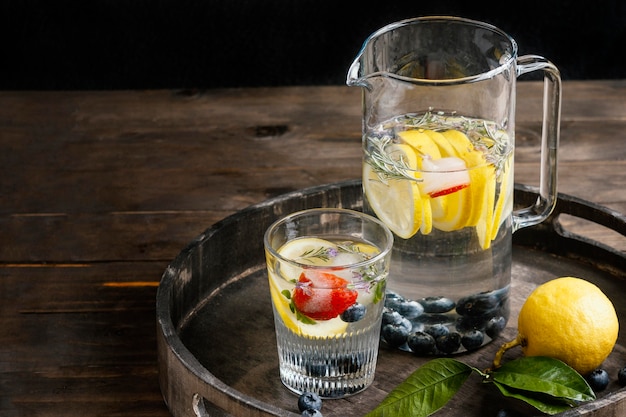 Healthy lemonade in glass arrangement