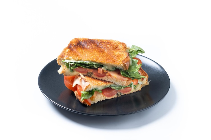 Free Photo healthy spinach tomato and cheese sandwich isolated on white background