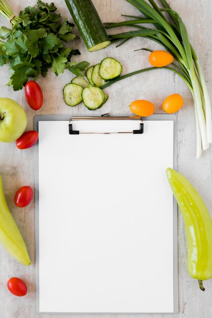 Healthy vegetables with clipboard