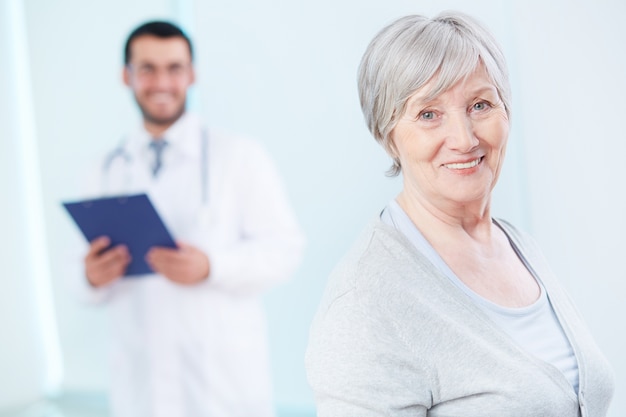 Healthy woman in doctor's office