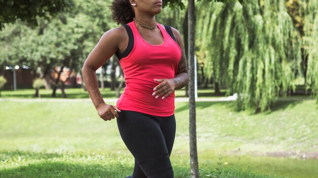 Healthy woman doing exercise outdoors