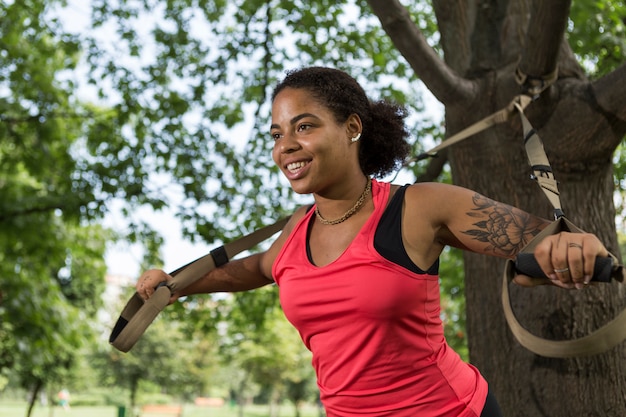 Healthy woman doing exercise outdoors