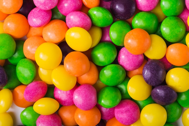 Free photo heap of colorful candy dots