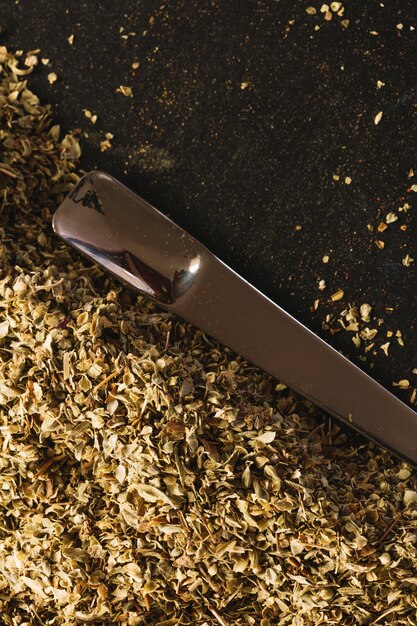 Heap of dill seeds and spoon