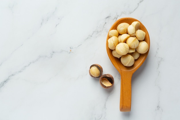 Heap of macadamia raw seed