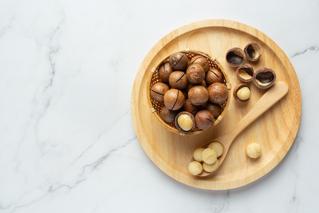 Heap of macadamia raw seed