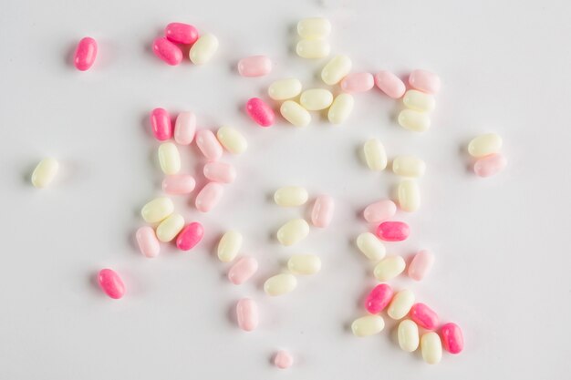 Heap of pastel-colored candy drops