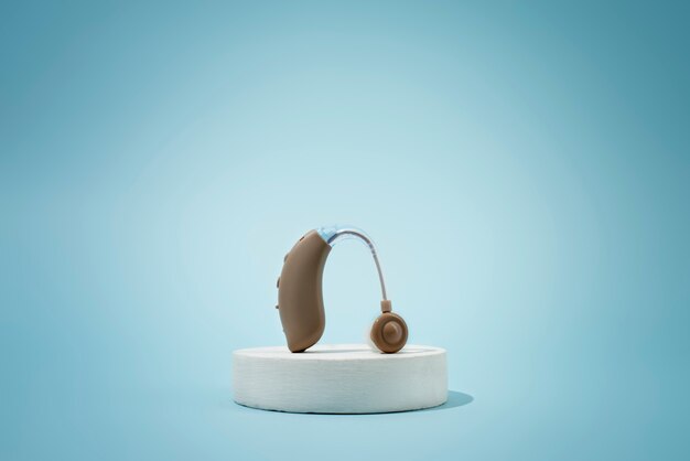 hearing aids on white podium