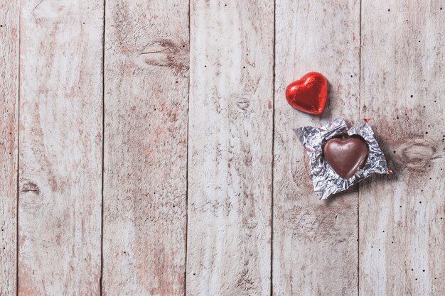 Heart of chocolate on a wooden table