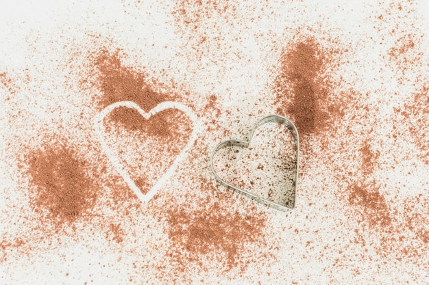 Heart on cocoa powder