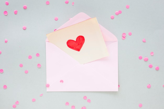 Free photo heart drawing on paper in envelope