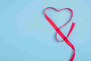 Free photo heart from red ribbon