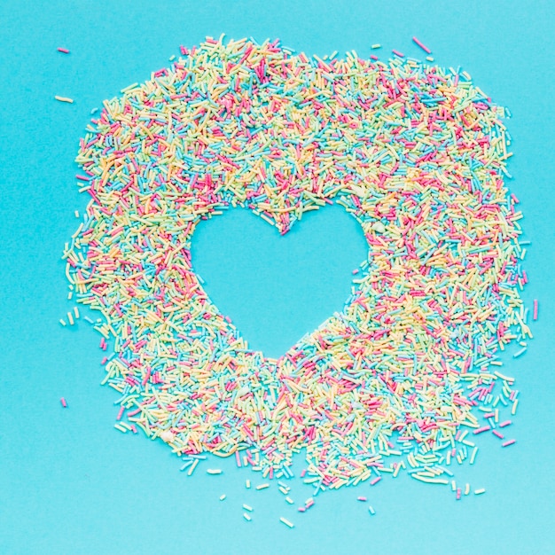 Heart in heap of sprinkles