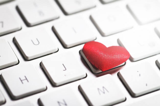 Free photo heart on the keyboard of a computer