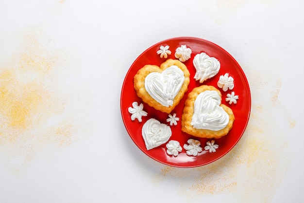 Free photo heart shaped cakes for valentine's day.