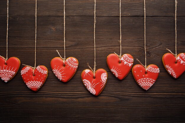 Heart-shaped cookies hanging from ropes