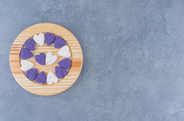 Heart shaped cookies on the plate ,on the marble background. 