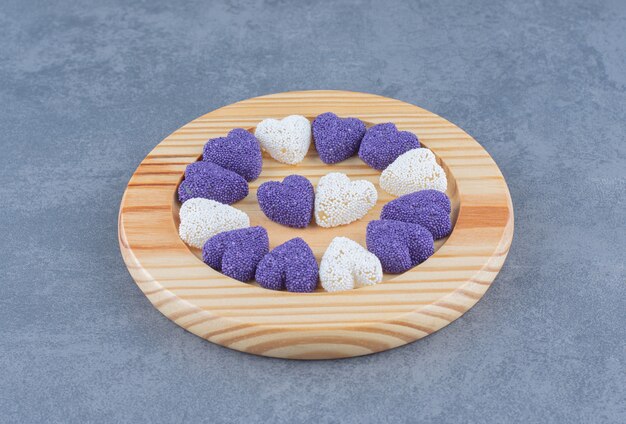 Heart shaped cookies on the plate ,on the marble background. 