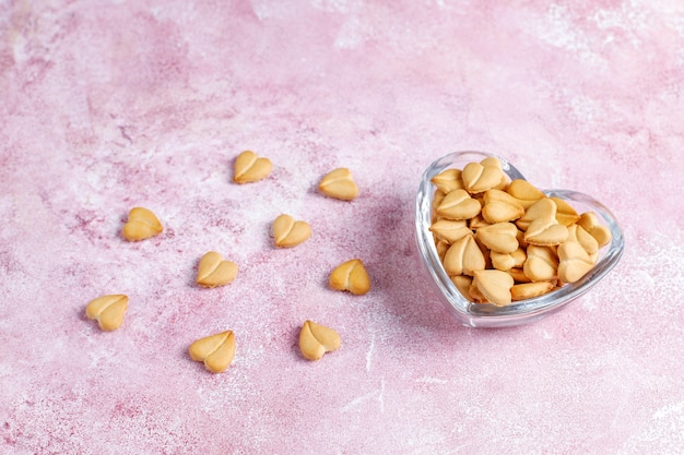 Heart shaped crackers in a heart shaped bowl.