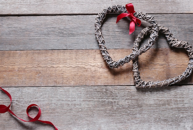 Heart shaped frames and red ribbon