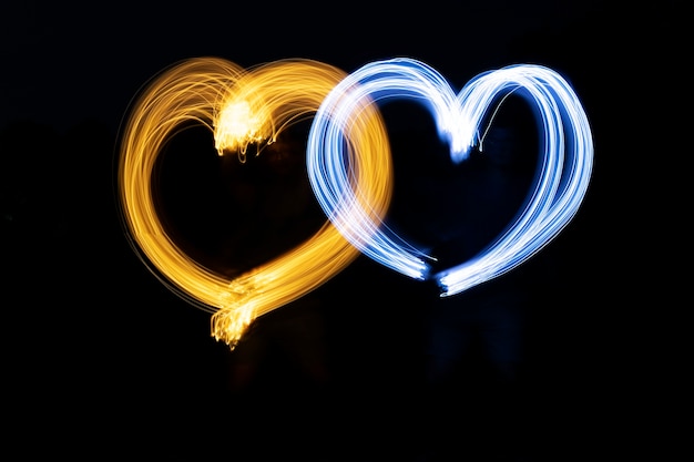 Heart shaped light painting with dark background