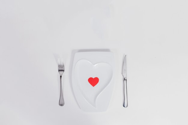 Heart-shaped plate with cutlery