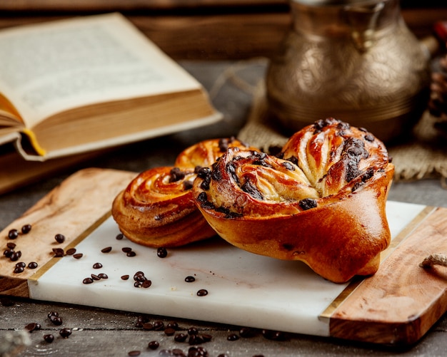 Heart-shaped sweet buns with chocolate pieces