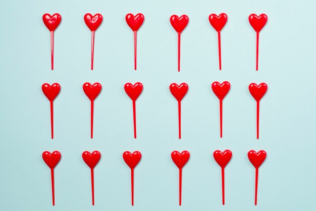 Heart sticks on blue background