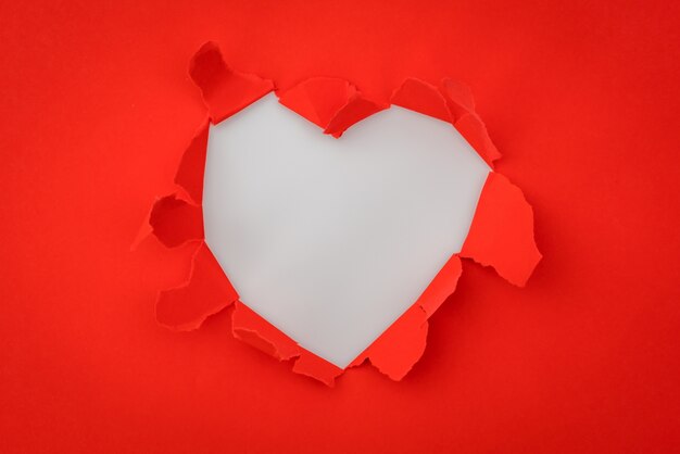 heart torn paper with space for text .