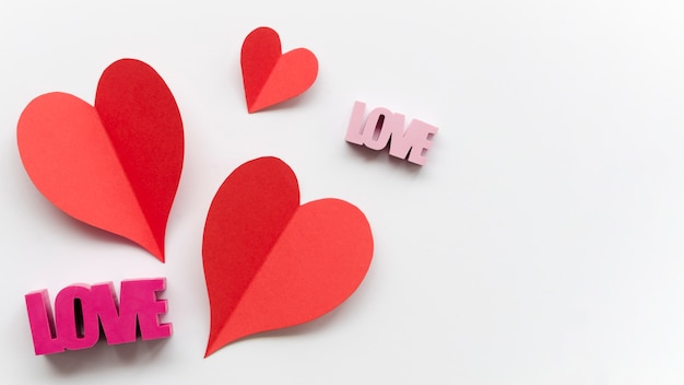 Free photo heart with love decoration beside