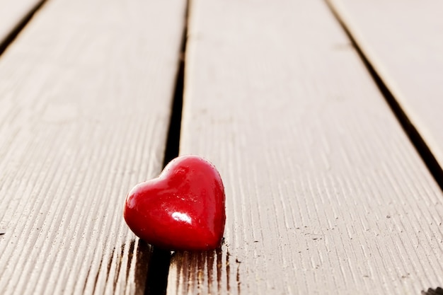 Heart on wooden boards