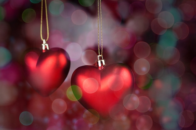 Hearts hanging from a rope with background out of focus