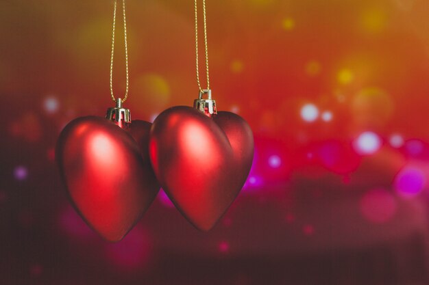 Hearts hanging from a rope with blurred background