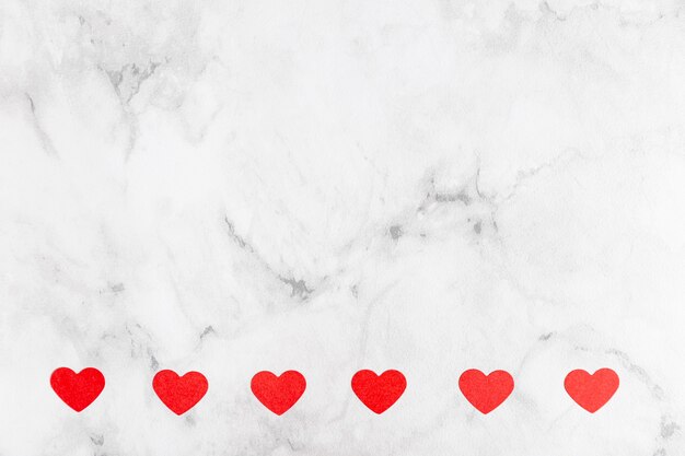 Hearts on marble background