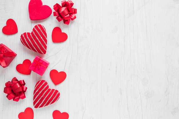 Hearts and presents on white background