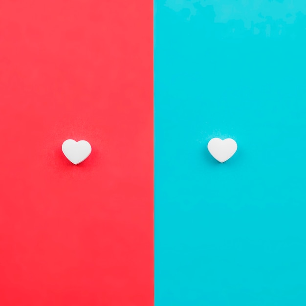 Free photo hearts on red and blue