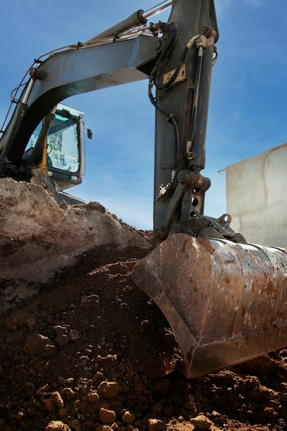 Heavy excavator for digging on day light outdoors