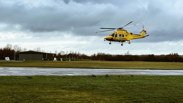 Free photo helicopter aw169 flying low