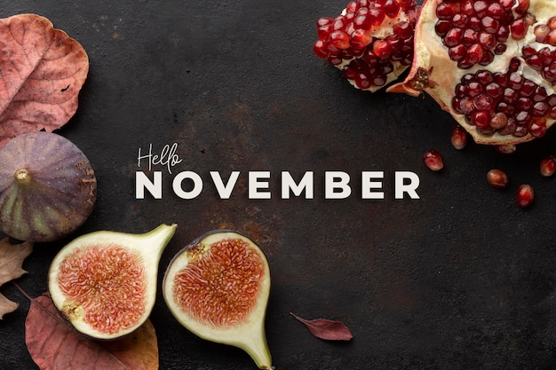 Hello november composition with figs and pomegranate