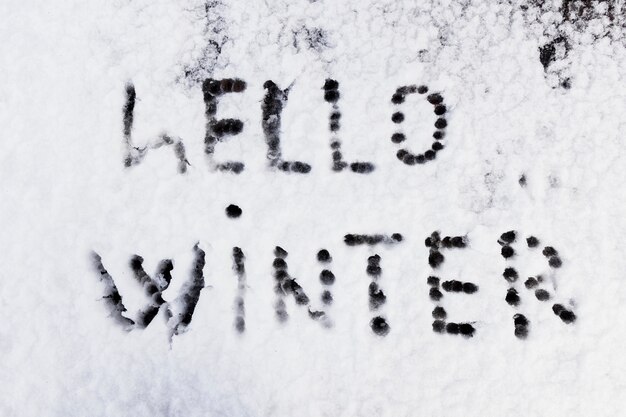 Hello winter text written on snow