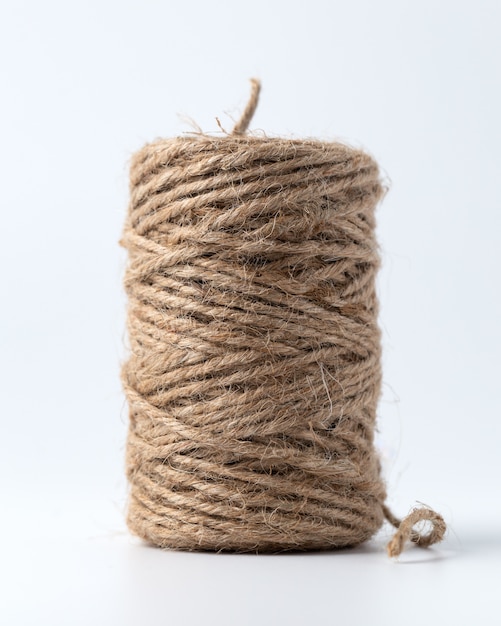 Hemp rope close-up on white isolated