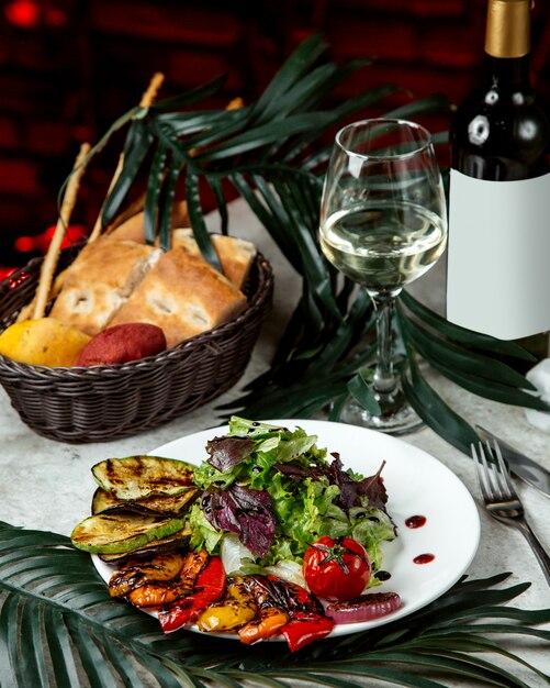 Herbal salad with fried vegetables