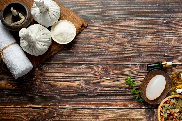 Herbal spa treatment equipments put on wooden floor