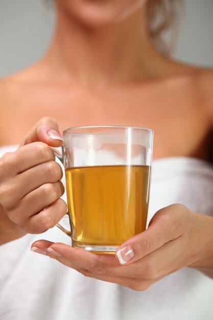 Herbal tea in woman's hands