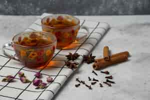 Free photo herbal winter tea in the cups with spices.